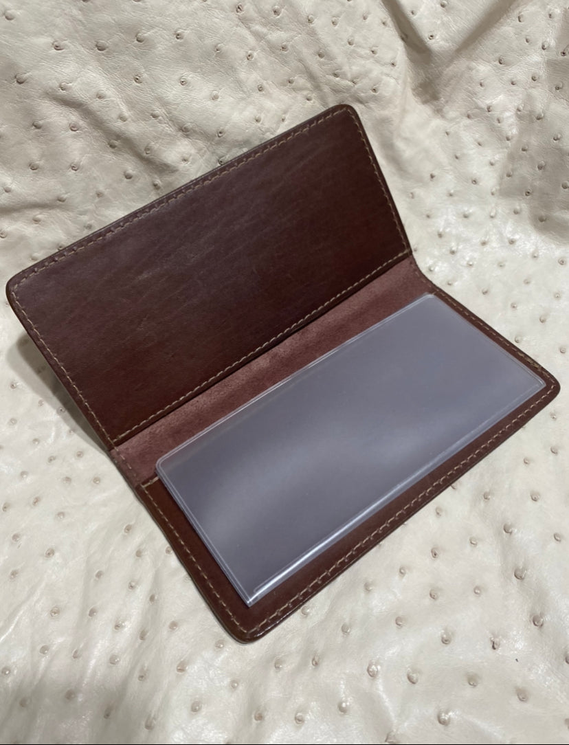Brown ostrich checkbook cover