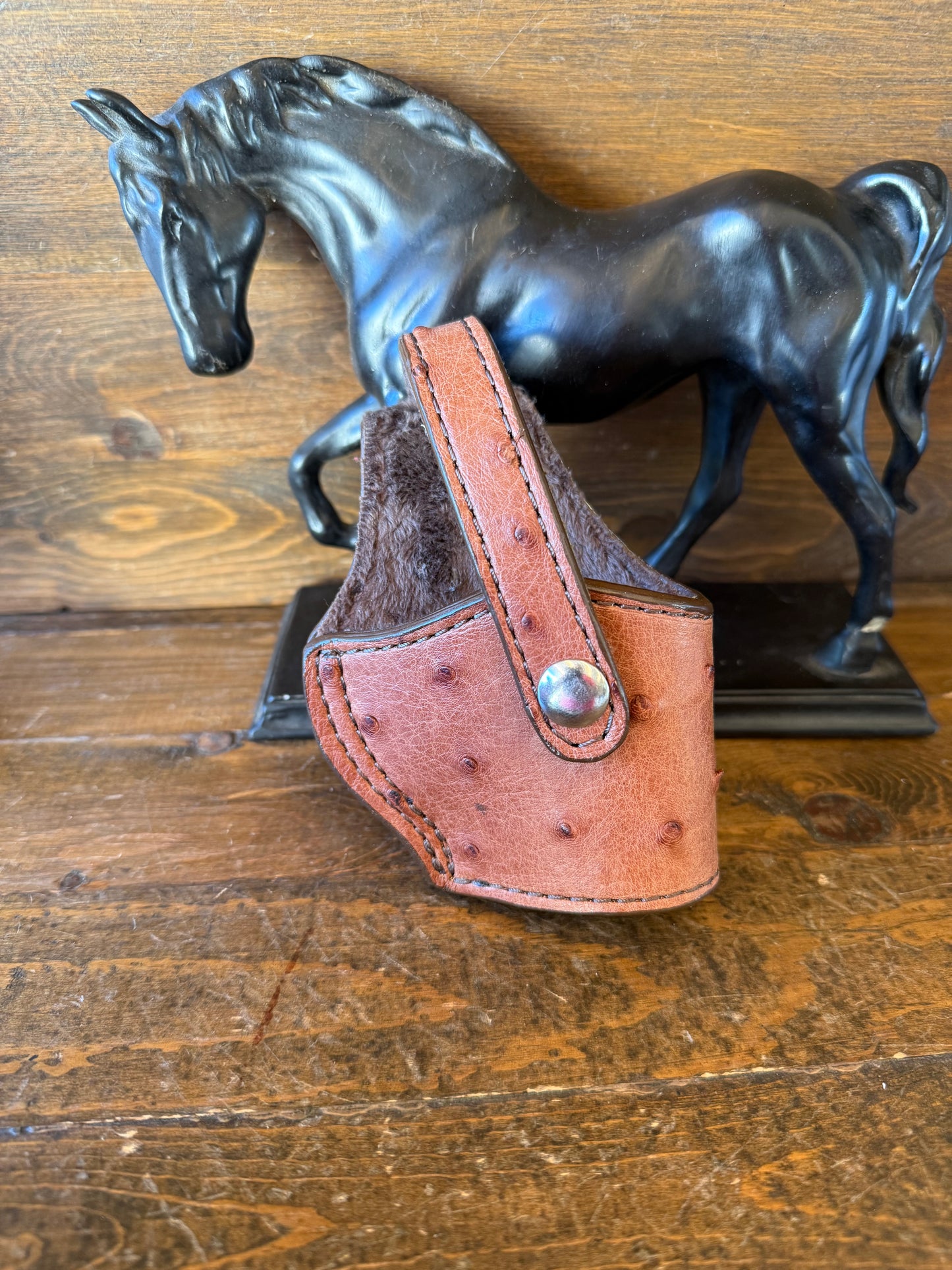 Gerbera/chrome ostrich skin compact holsters. (1911)