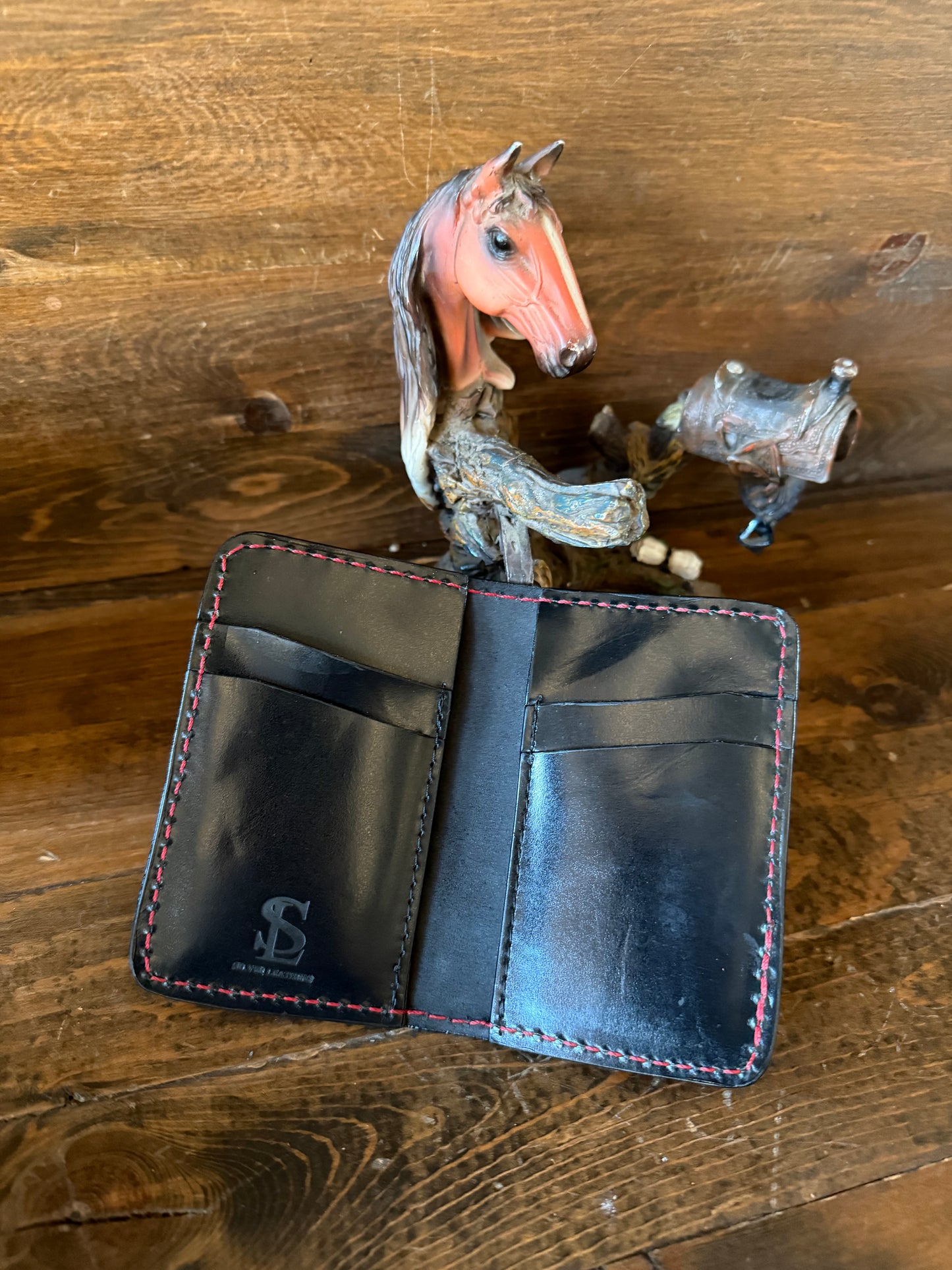Red ostrich skin compact wallet