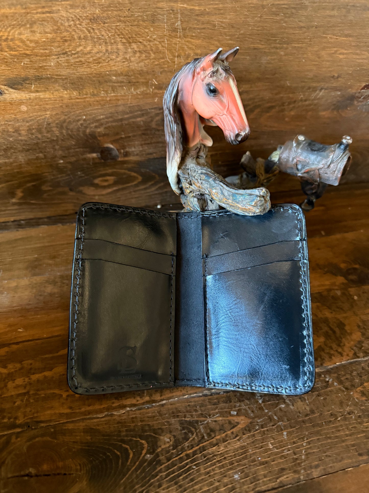 Black ostrich skin compact wallet