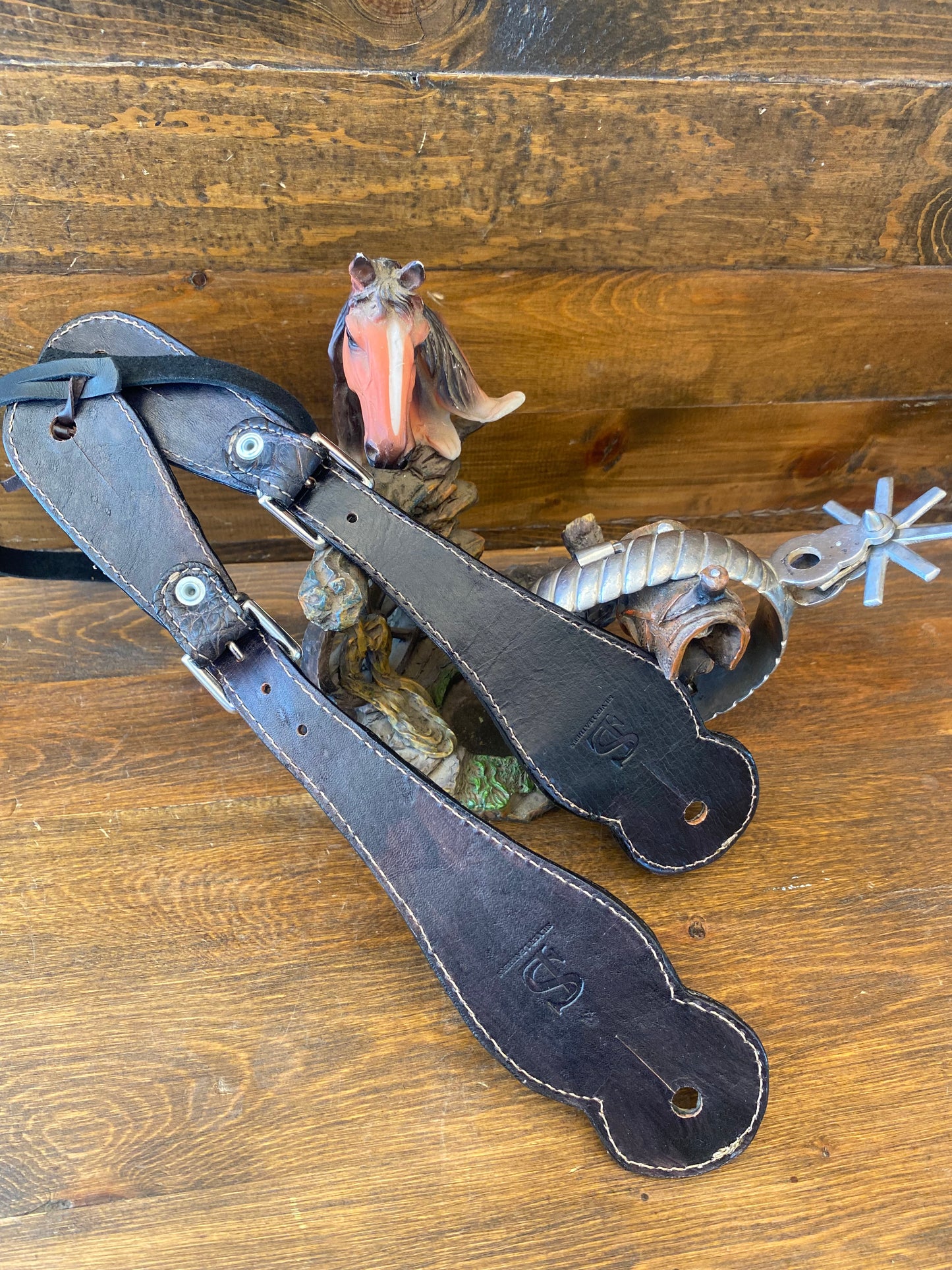 Dark brown crocodile spur straps