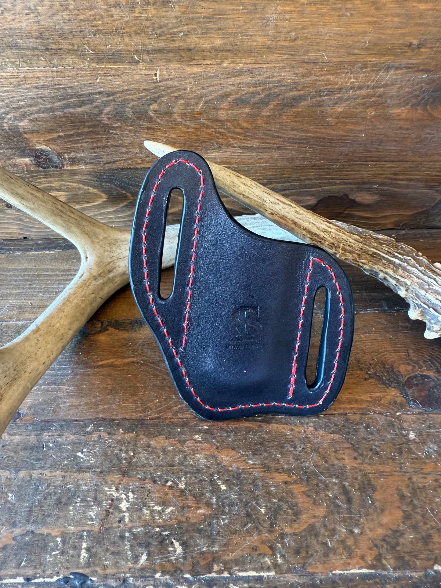 Black/red ostrich skin knife sheath