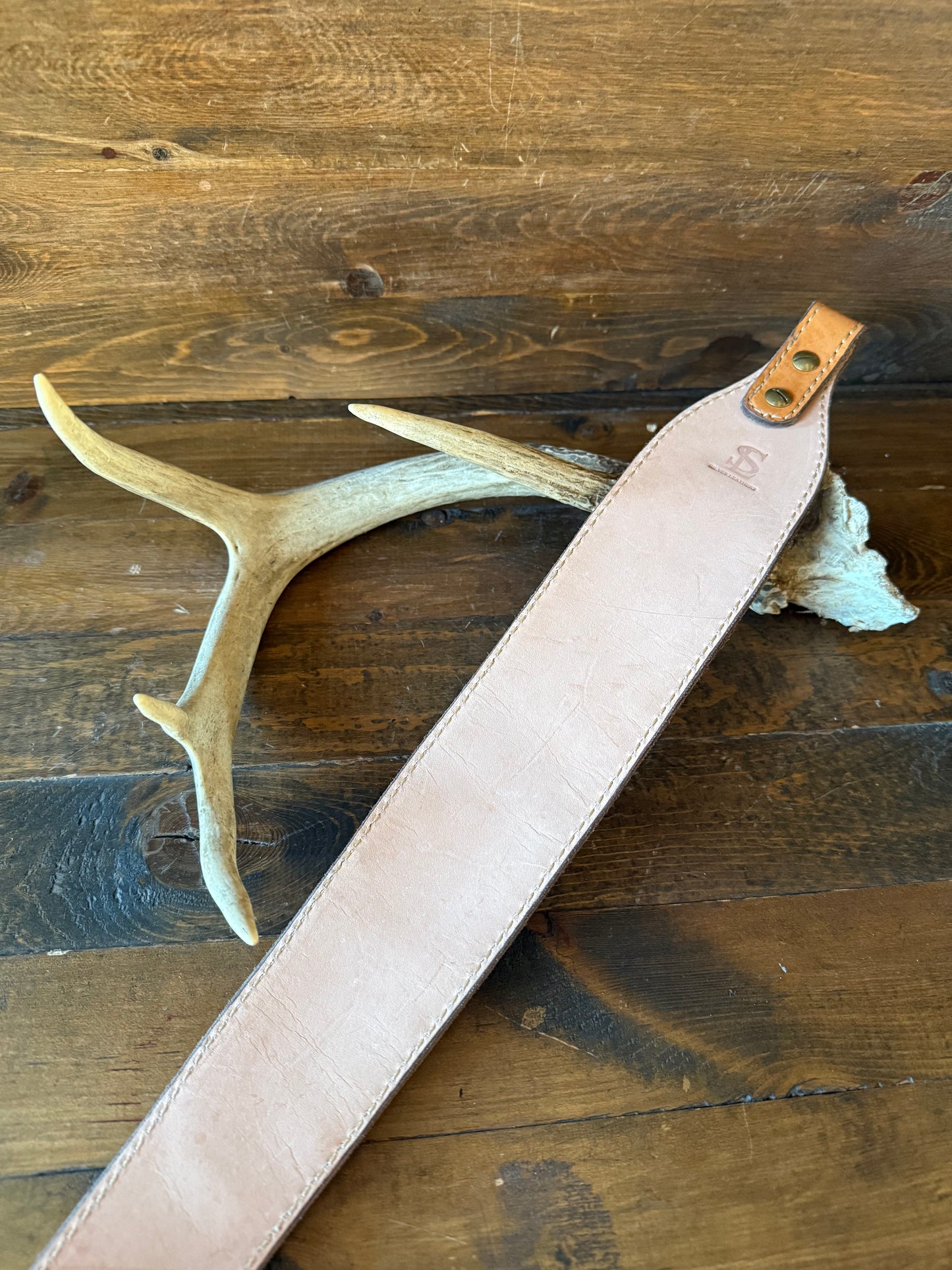 Black ostrich skin rifle sling