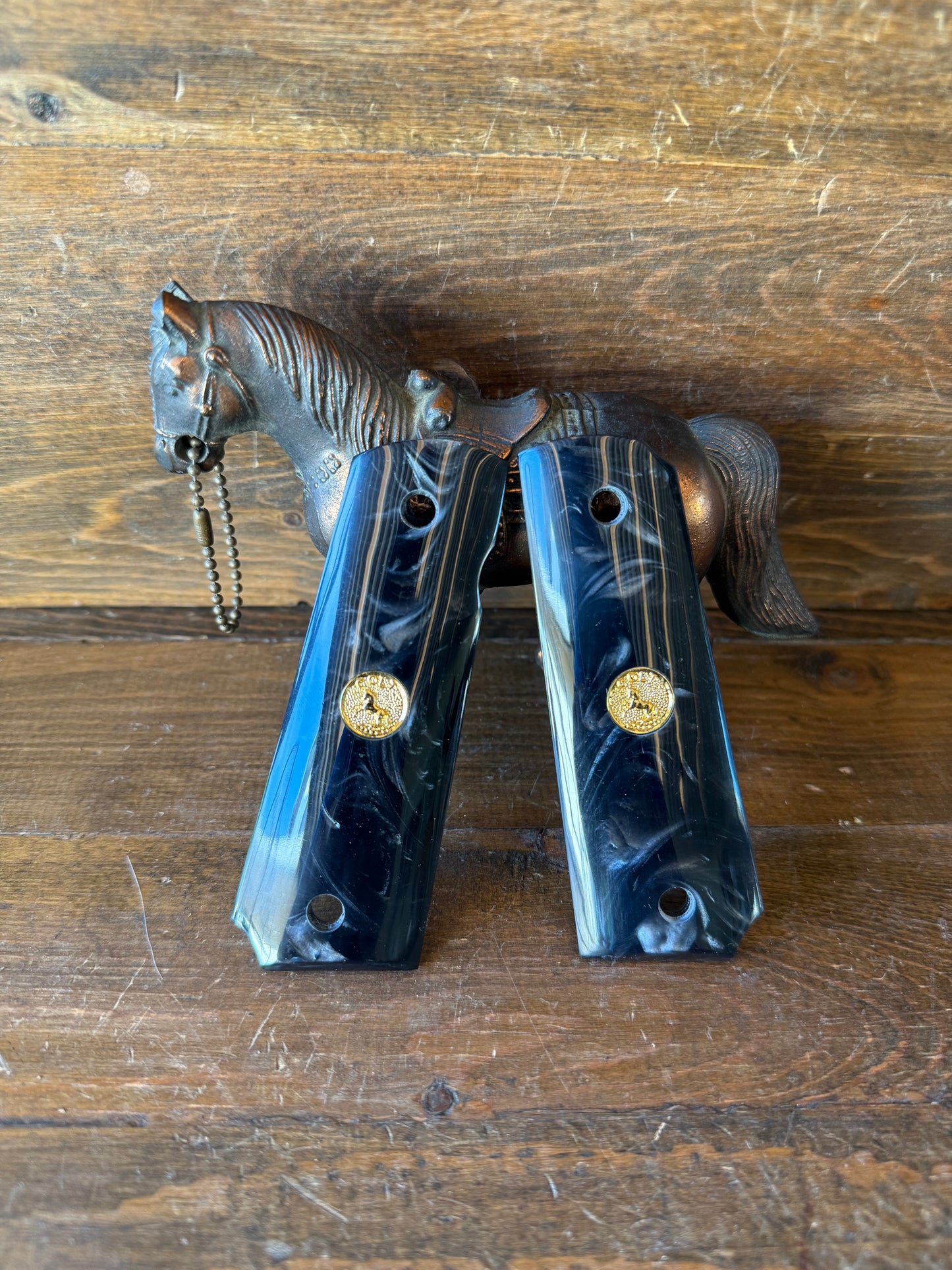 Black pearl w/gold colt logo grips (1911)