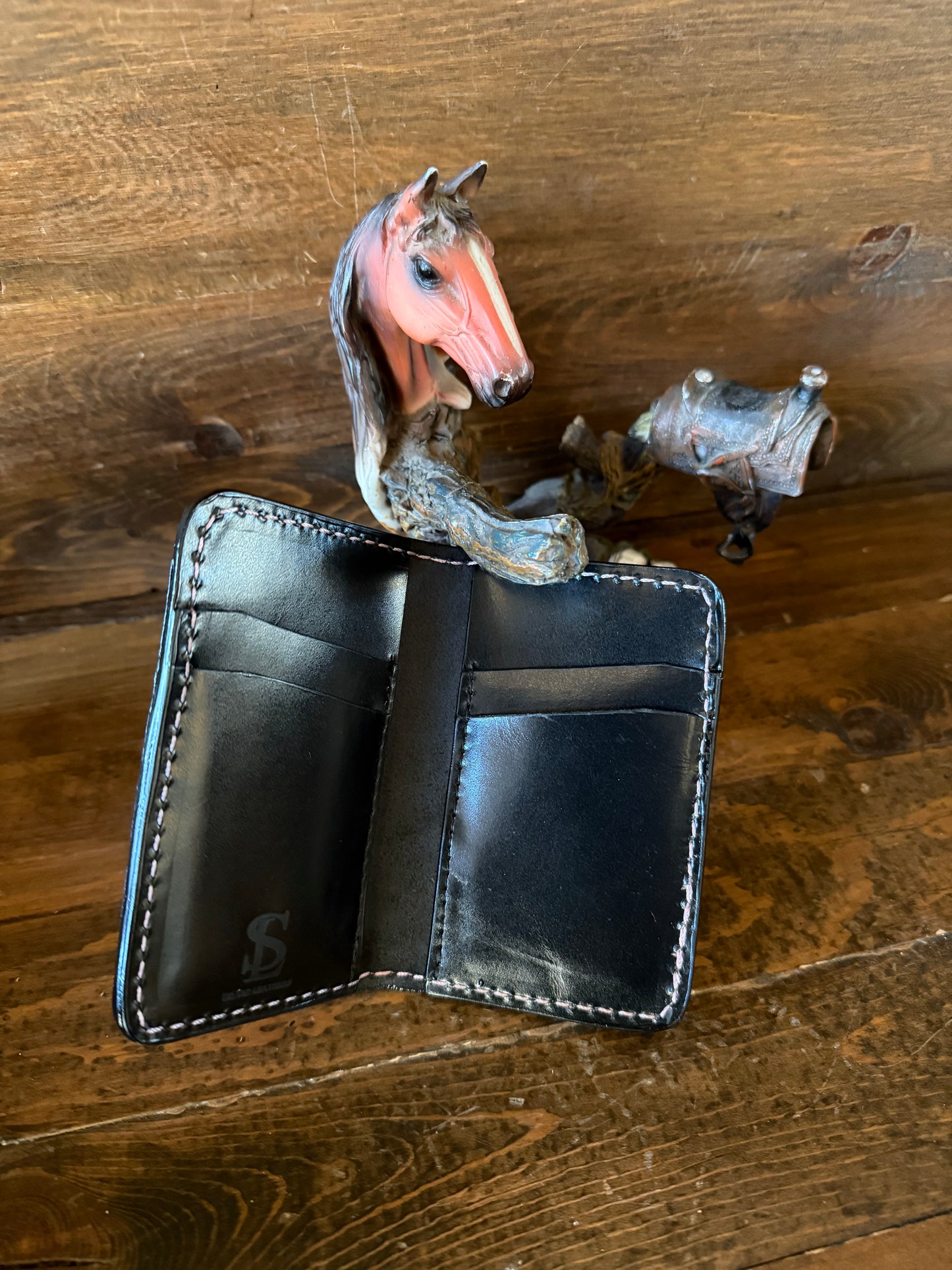 Pink ostrich skin compact wallet