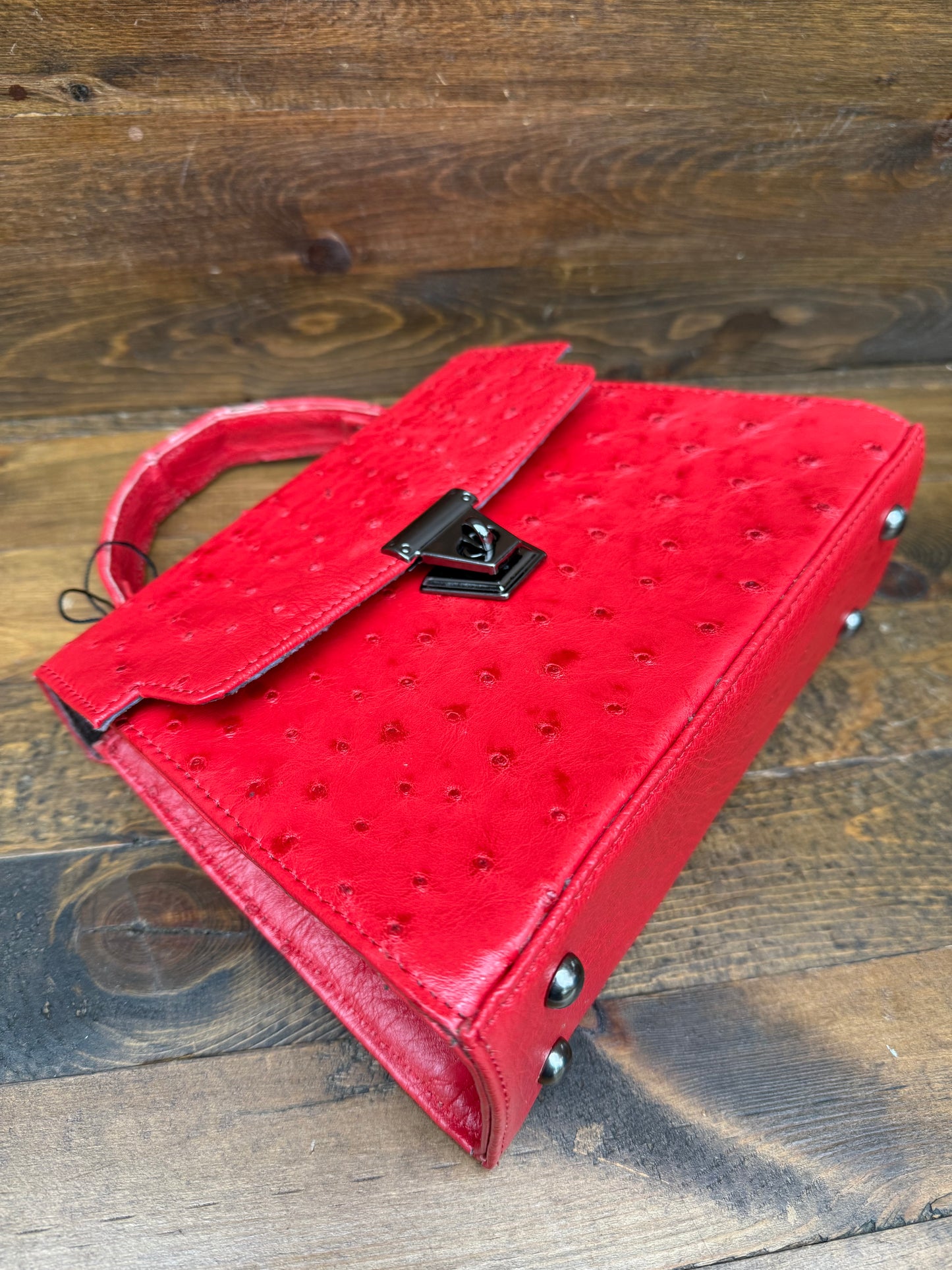 Red ostrich skin handbag