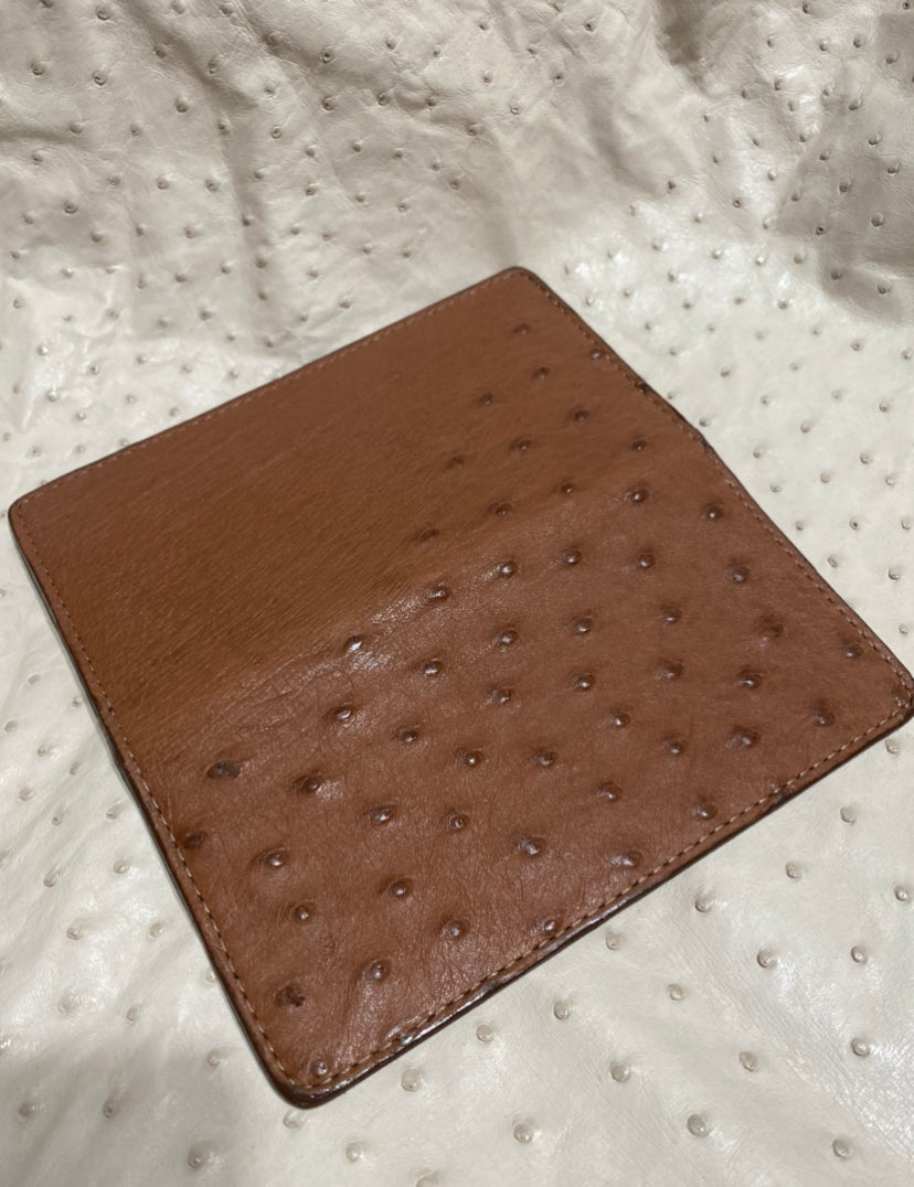Brown ostrich checkbook cover