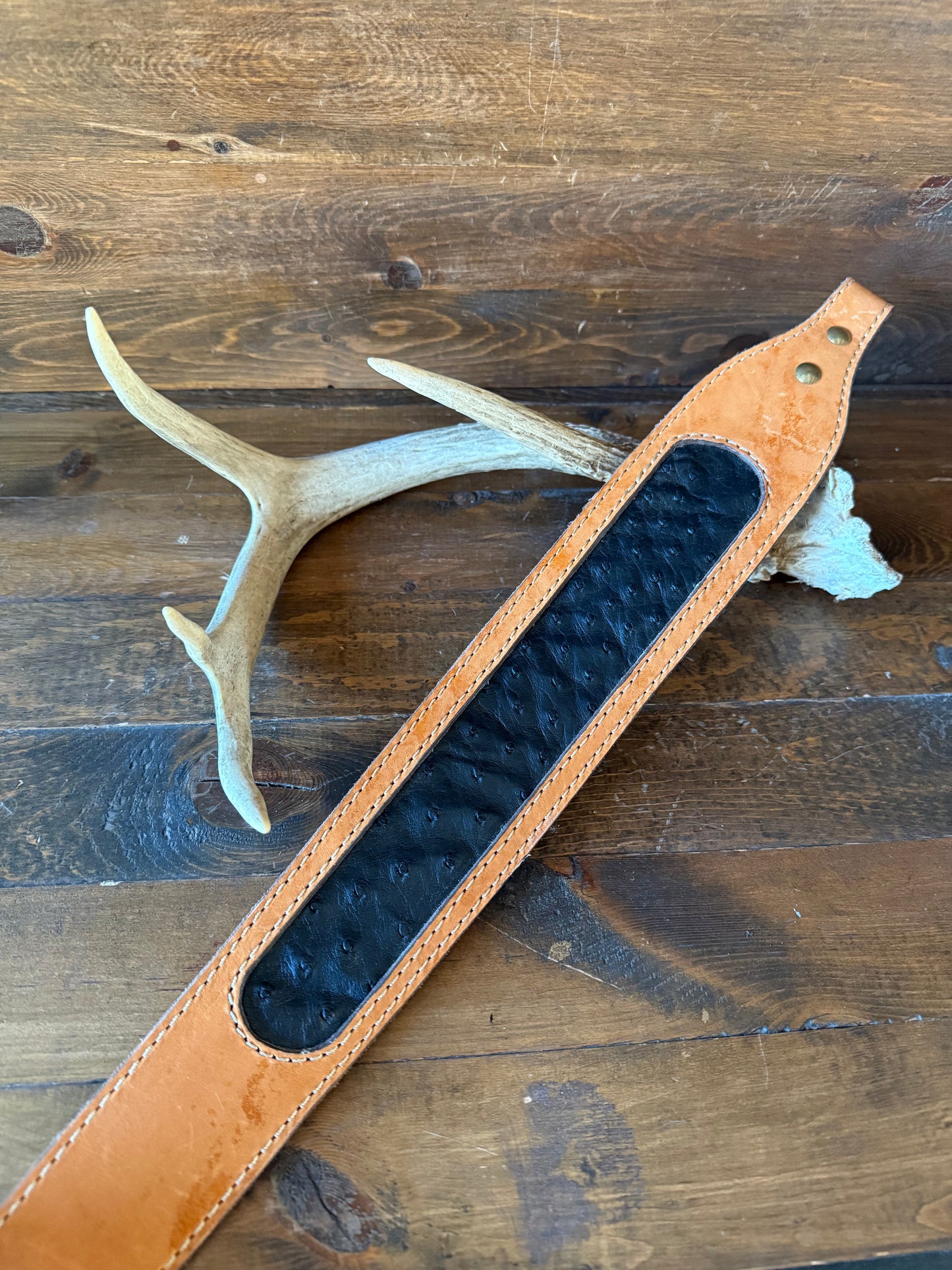 Black ostrich skin rifle sling