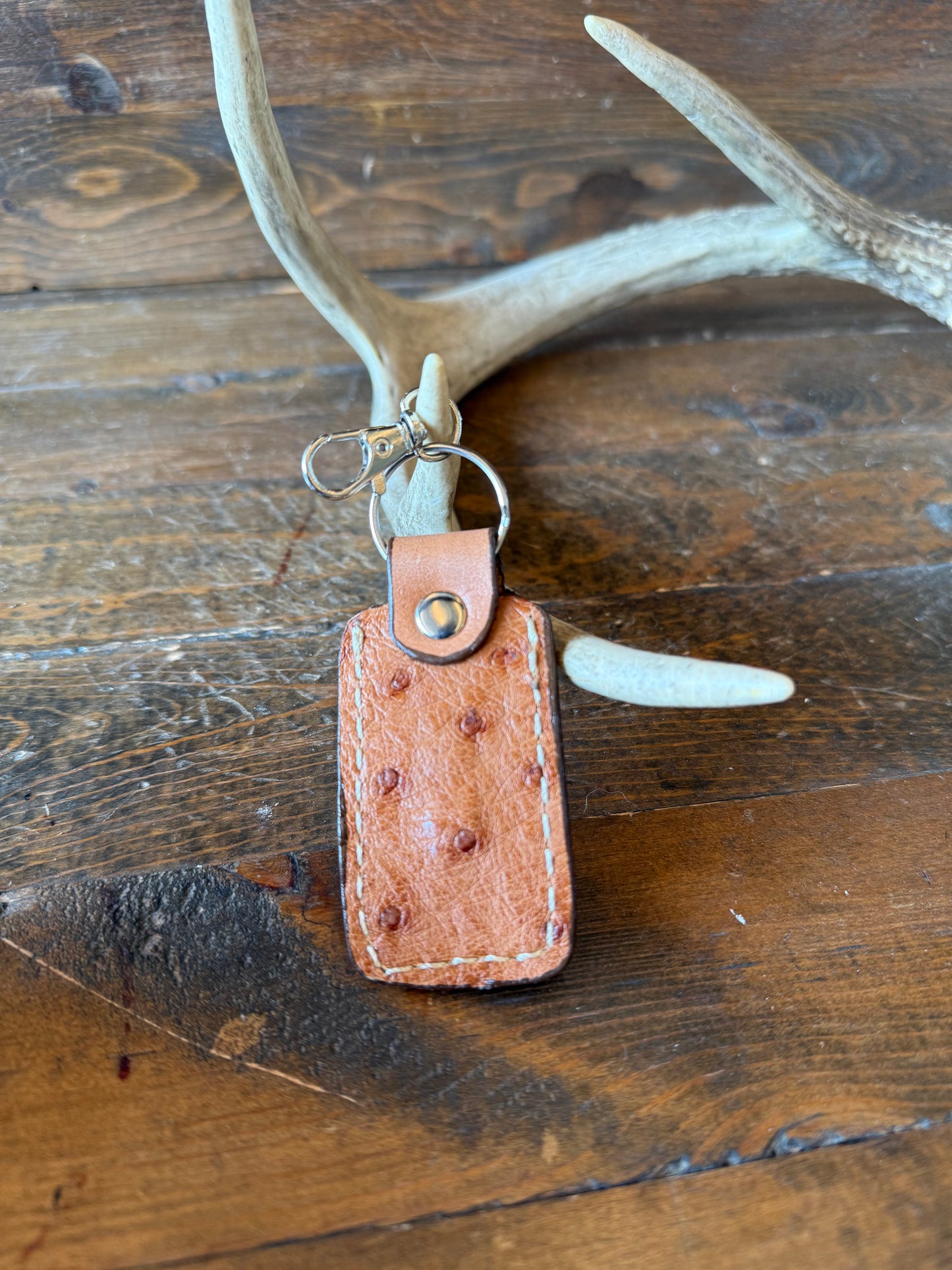 Conac ostrich skin bullet keychain