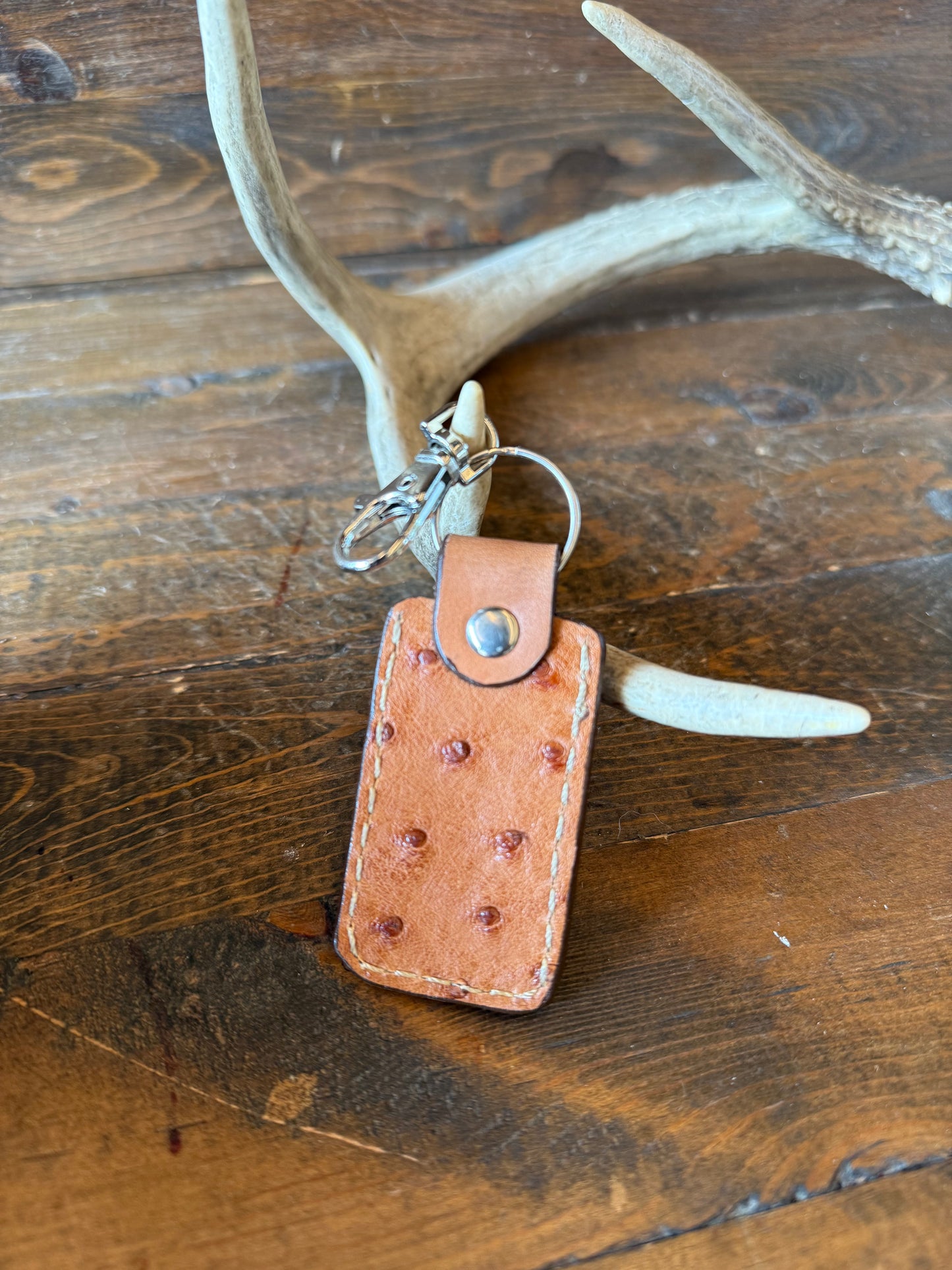 Conac ostrich skin long bullet keychain