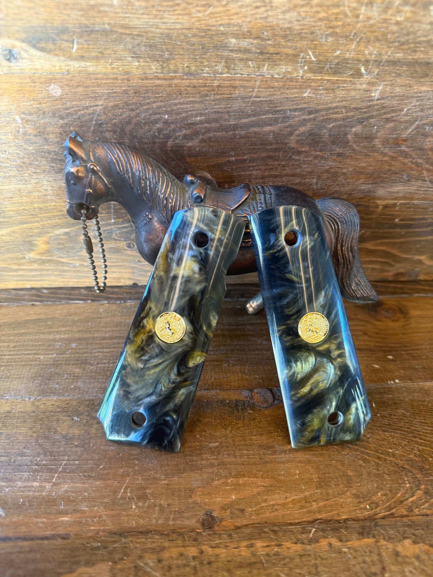 Black and gold Colt logo grips (1911)