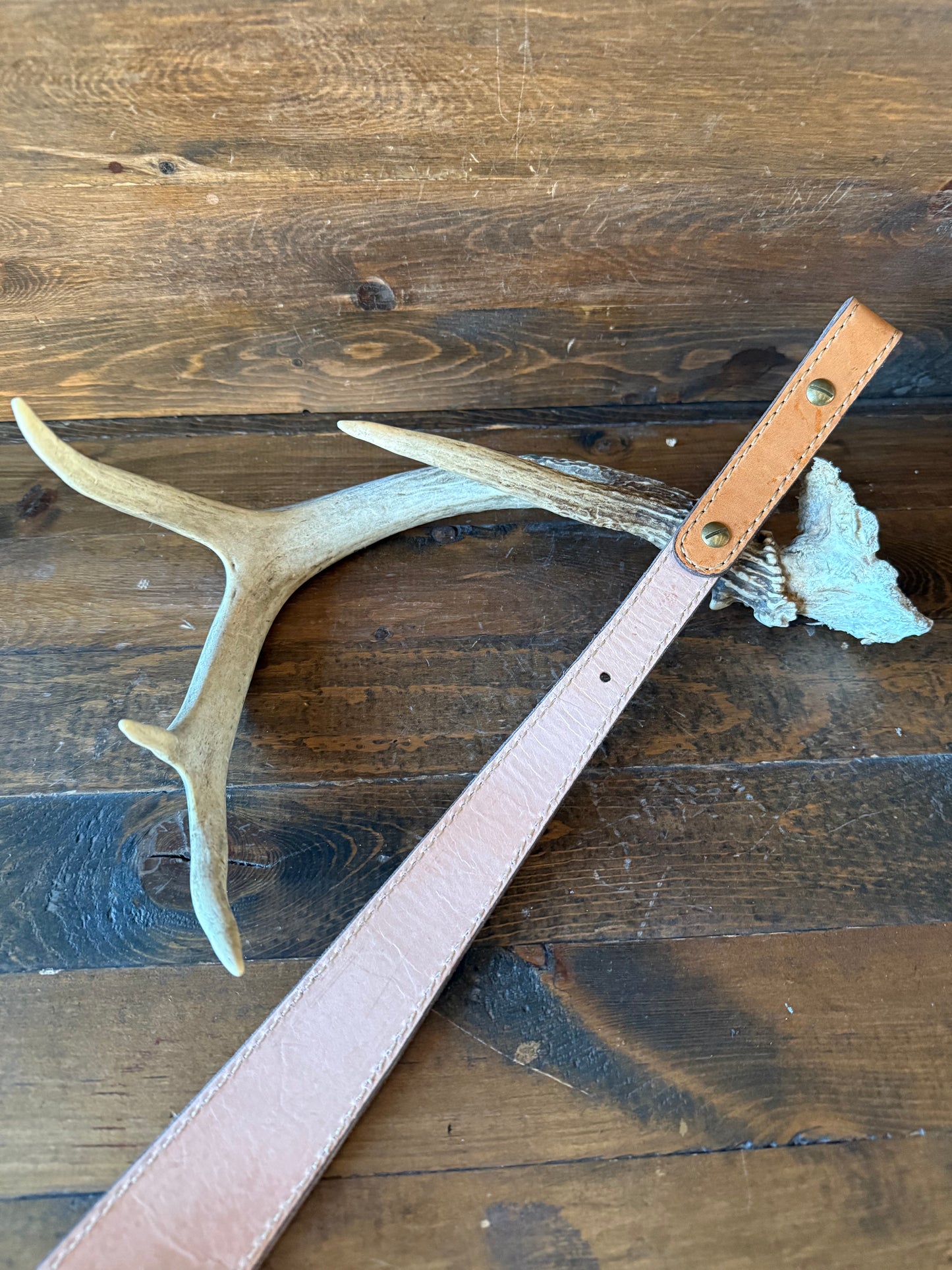 Black ostrich skin rifle sling