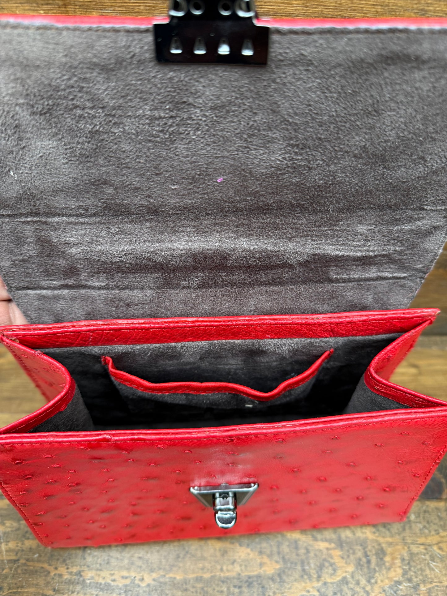 Red ostrich skin handbag