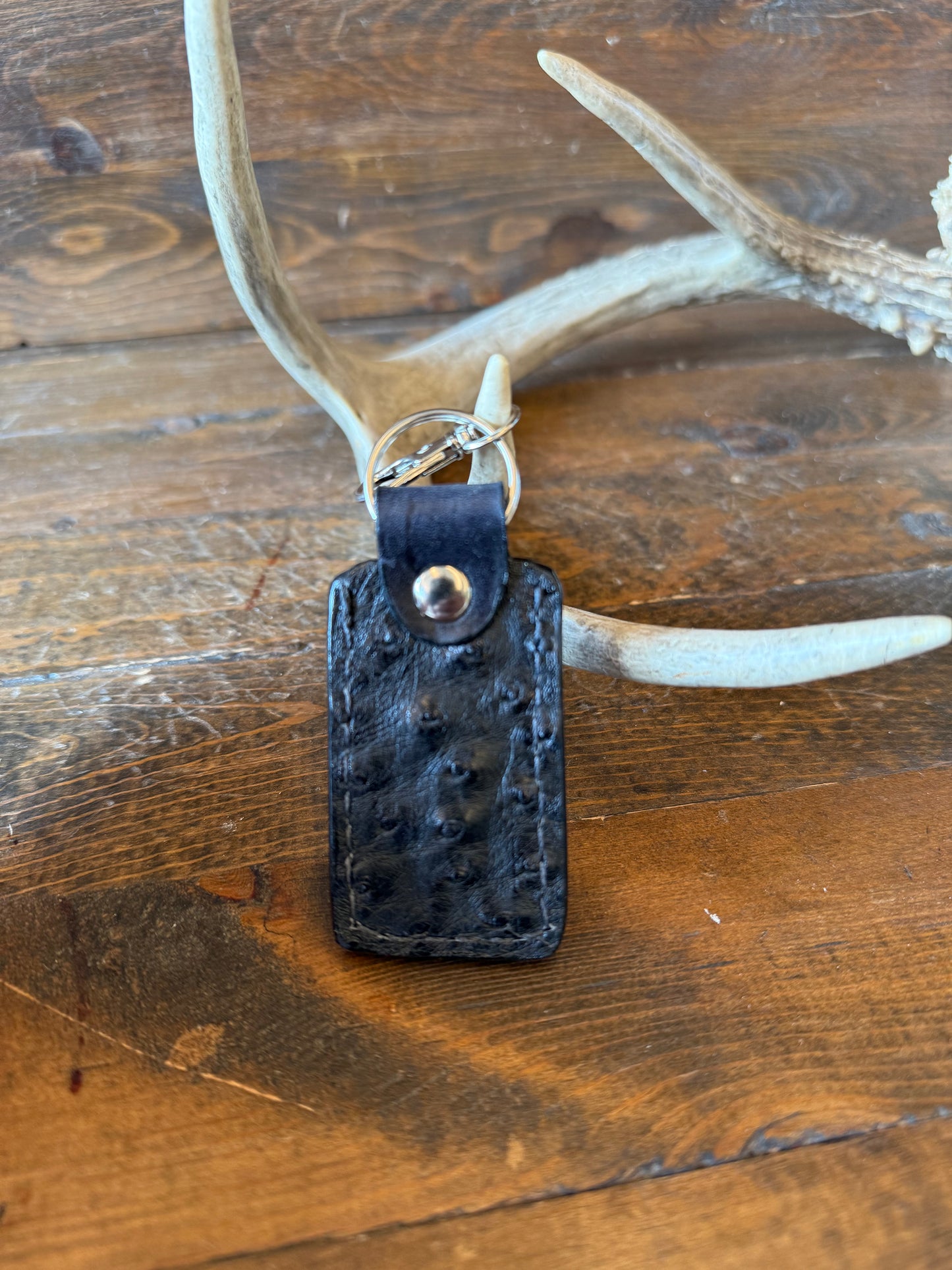 Black ostrich skin bullet keychain