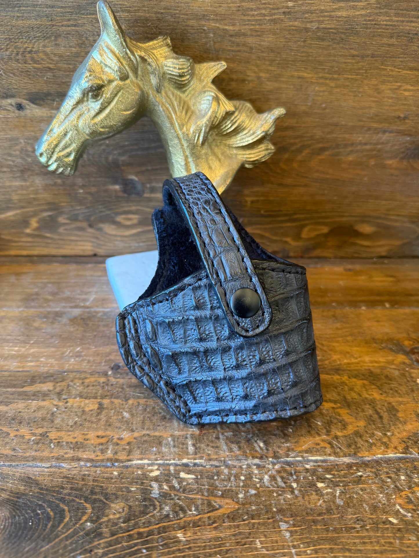 Matte black Hornback crocodile compact holster. (Beretta)