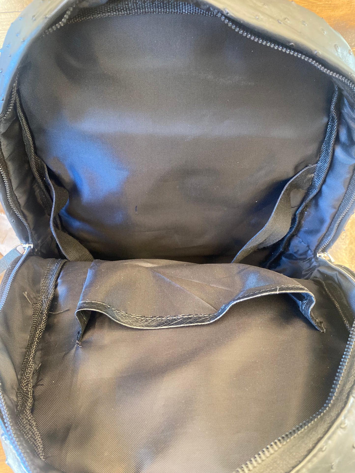 Black full ostrich luxury backpack