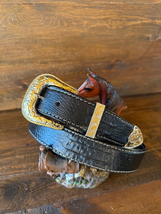Black crocodile belt. Gold/chrome western buckle.