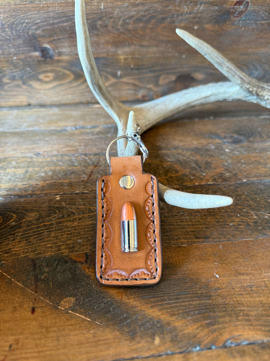 Conac ostrich skin bullet keychain