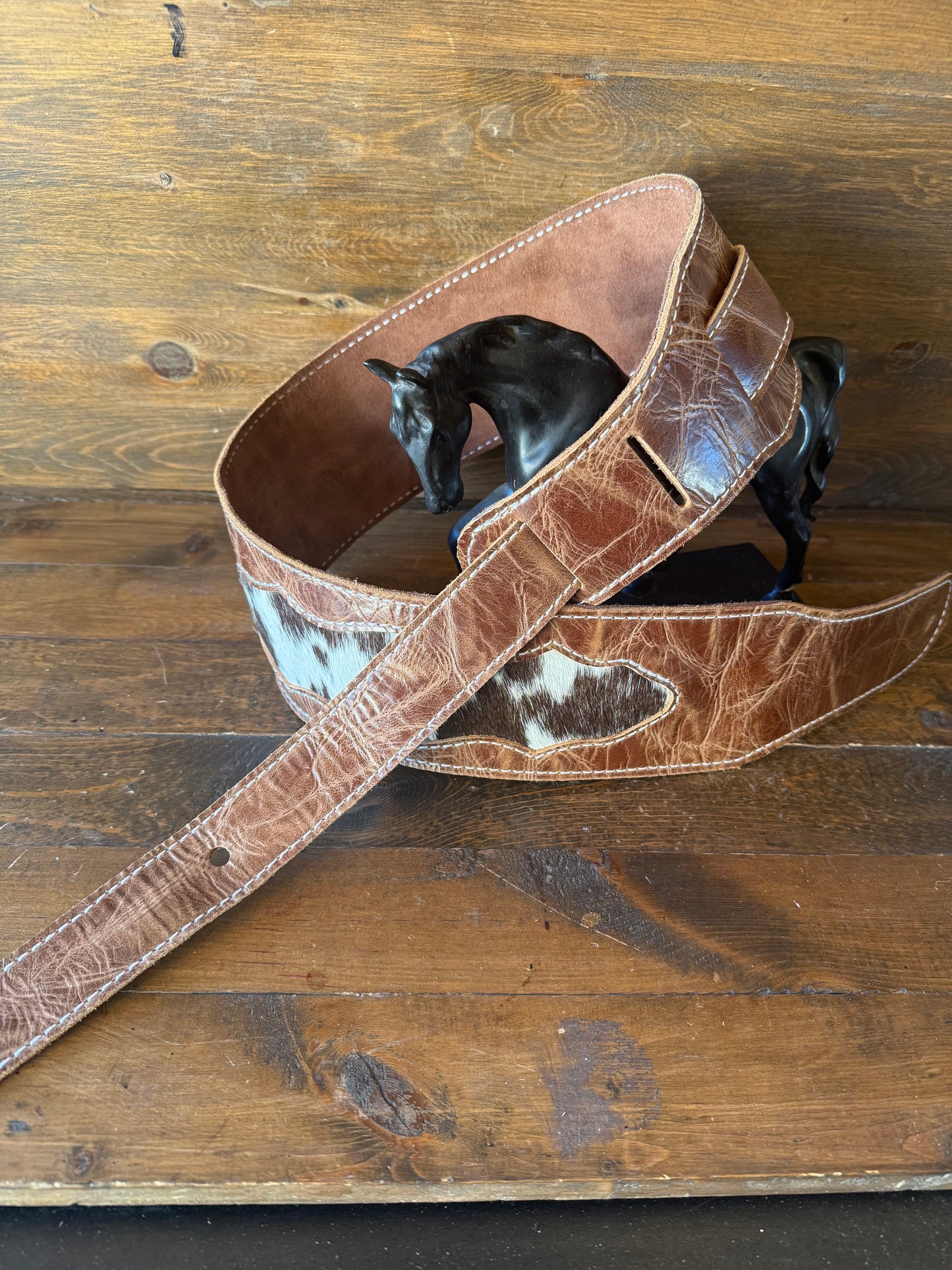 Brown cowhide guitar strap