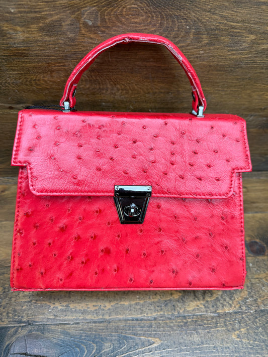 Red ostrich skin handbag