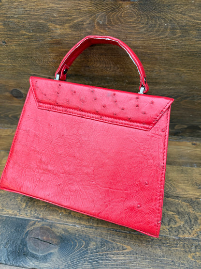 Red ostrich skin handbag