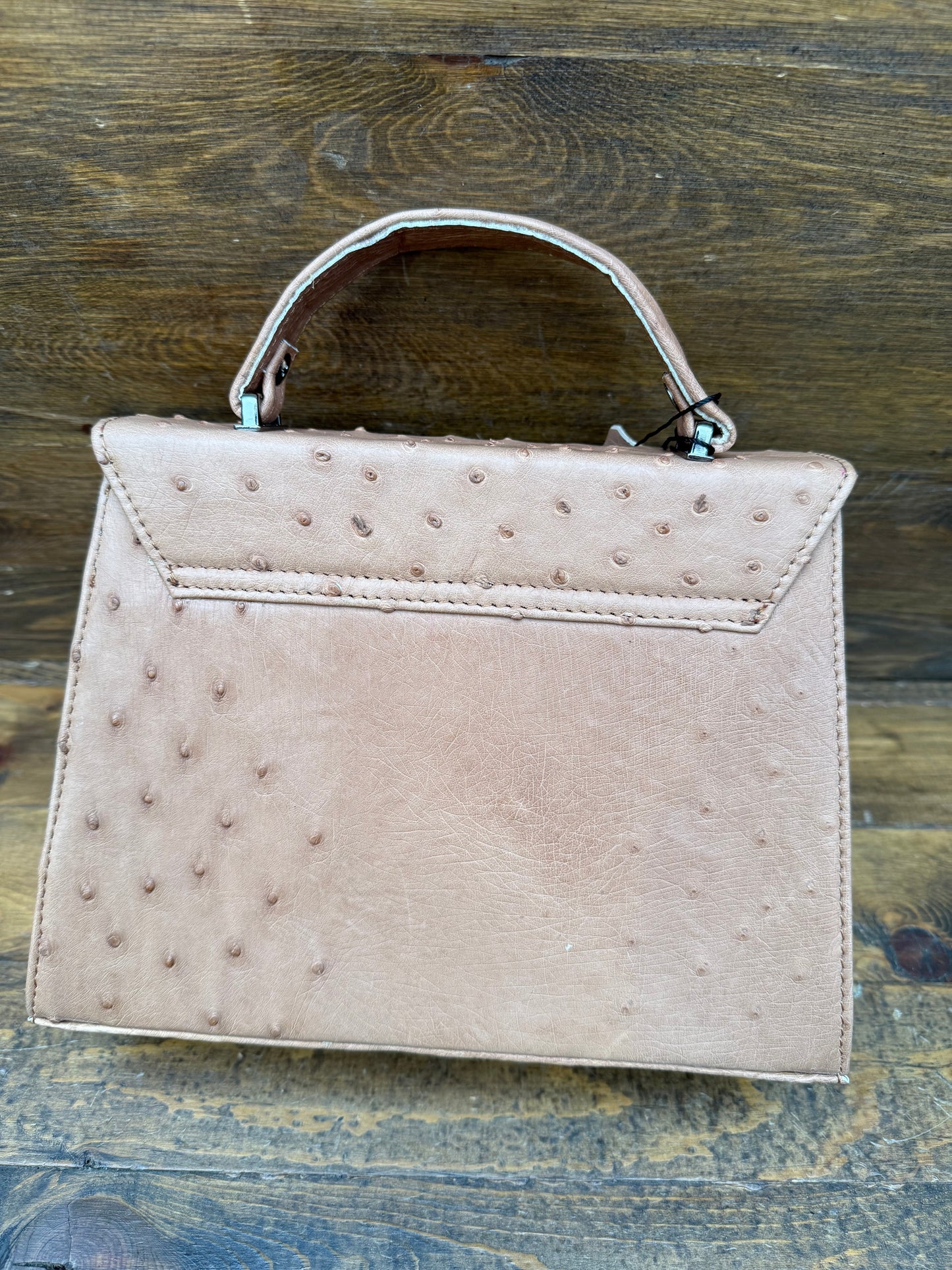 Almond ostrich skin handbag