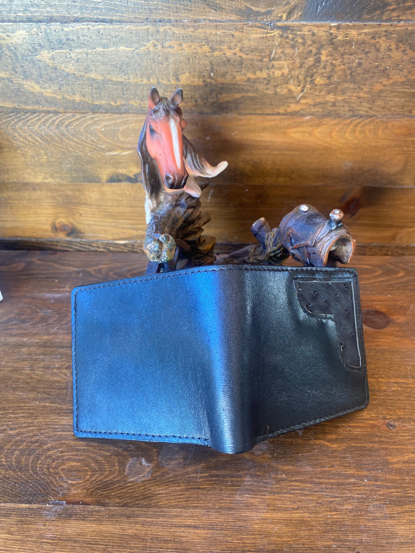 Black ostrich corner wallet