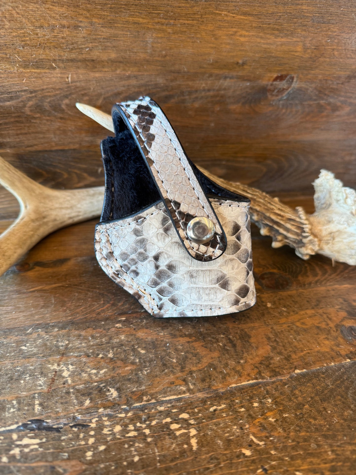 Natural snake skin compact holster. (1911)
