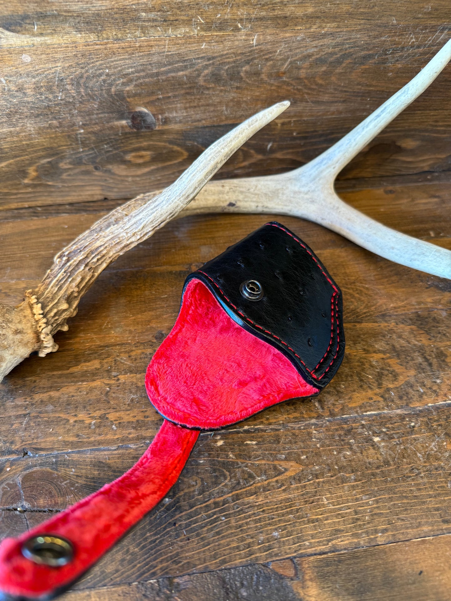 Black/red ostrich skin compact holster W/belt clip. (1911)