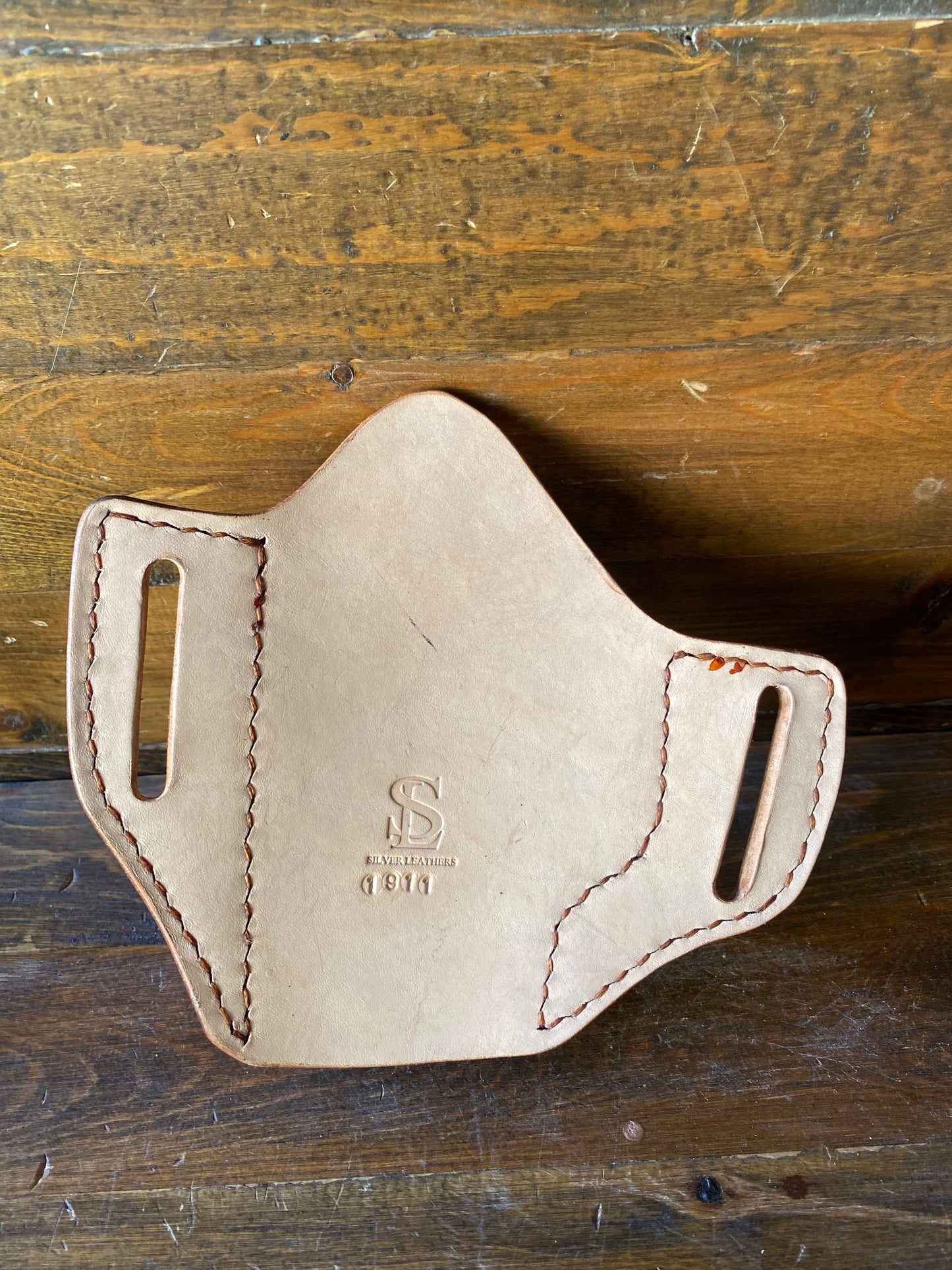 Natural Veg tan holster. (1911)