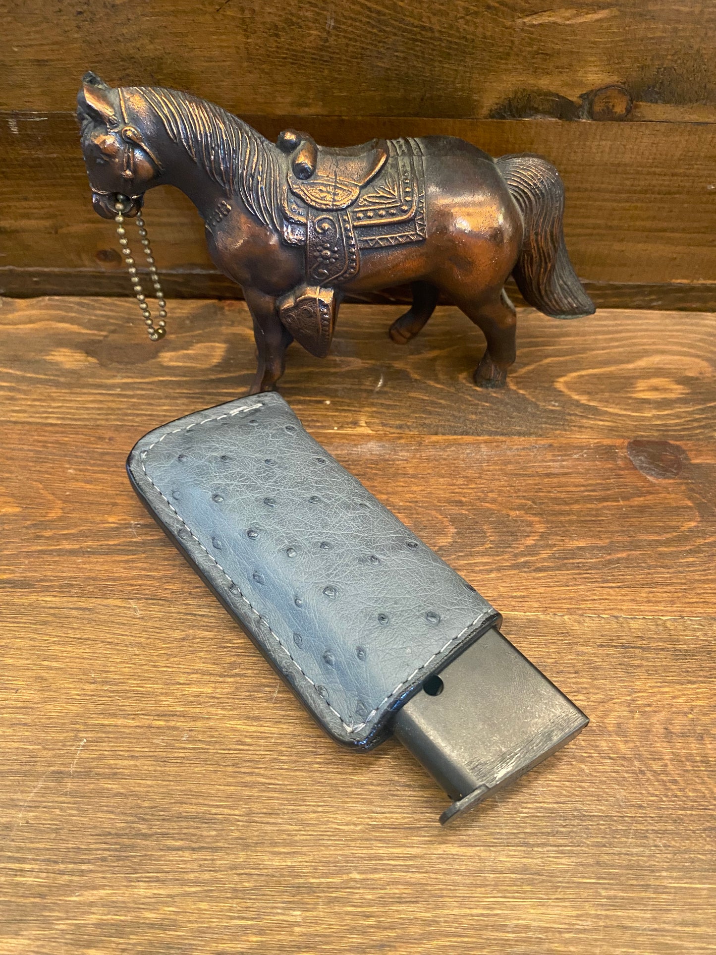 Gray ostrich skin single magazine holster ( 1911 )