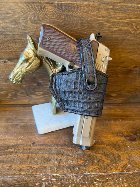 Matte black Hornback crocodile compact holster. (Beretta)