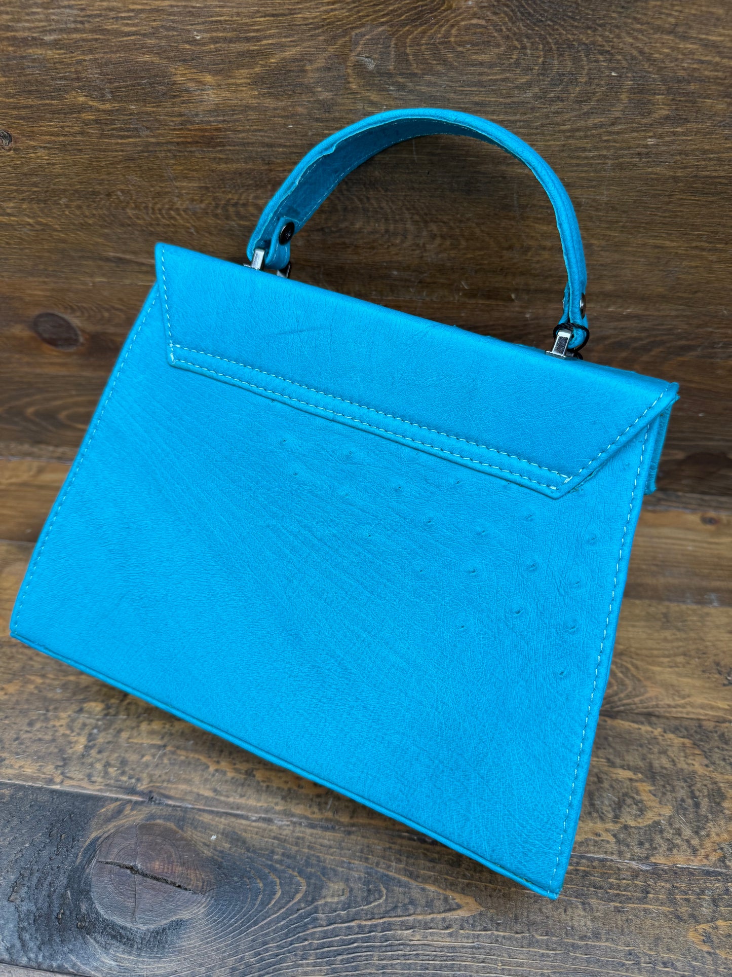 Turquoise Blue Ostrich skin handbag