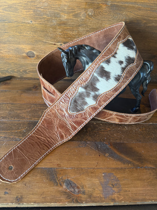 Brown cowhide guitar strap