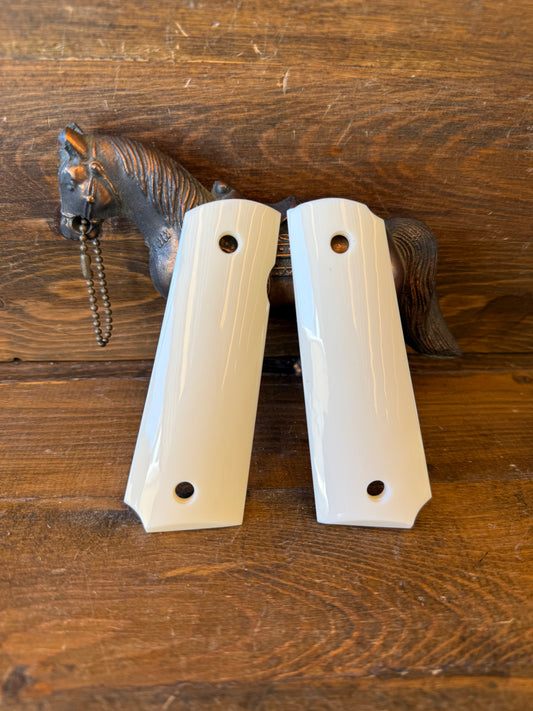 Bonded ivory color grips (1911)