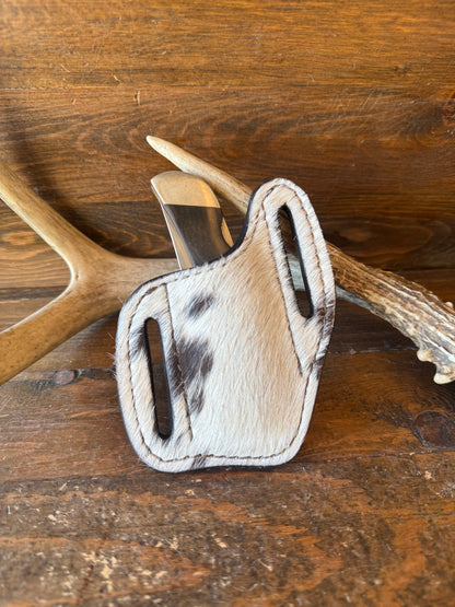 Brown/white. Cowhide knife sheath