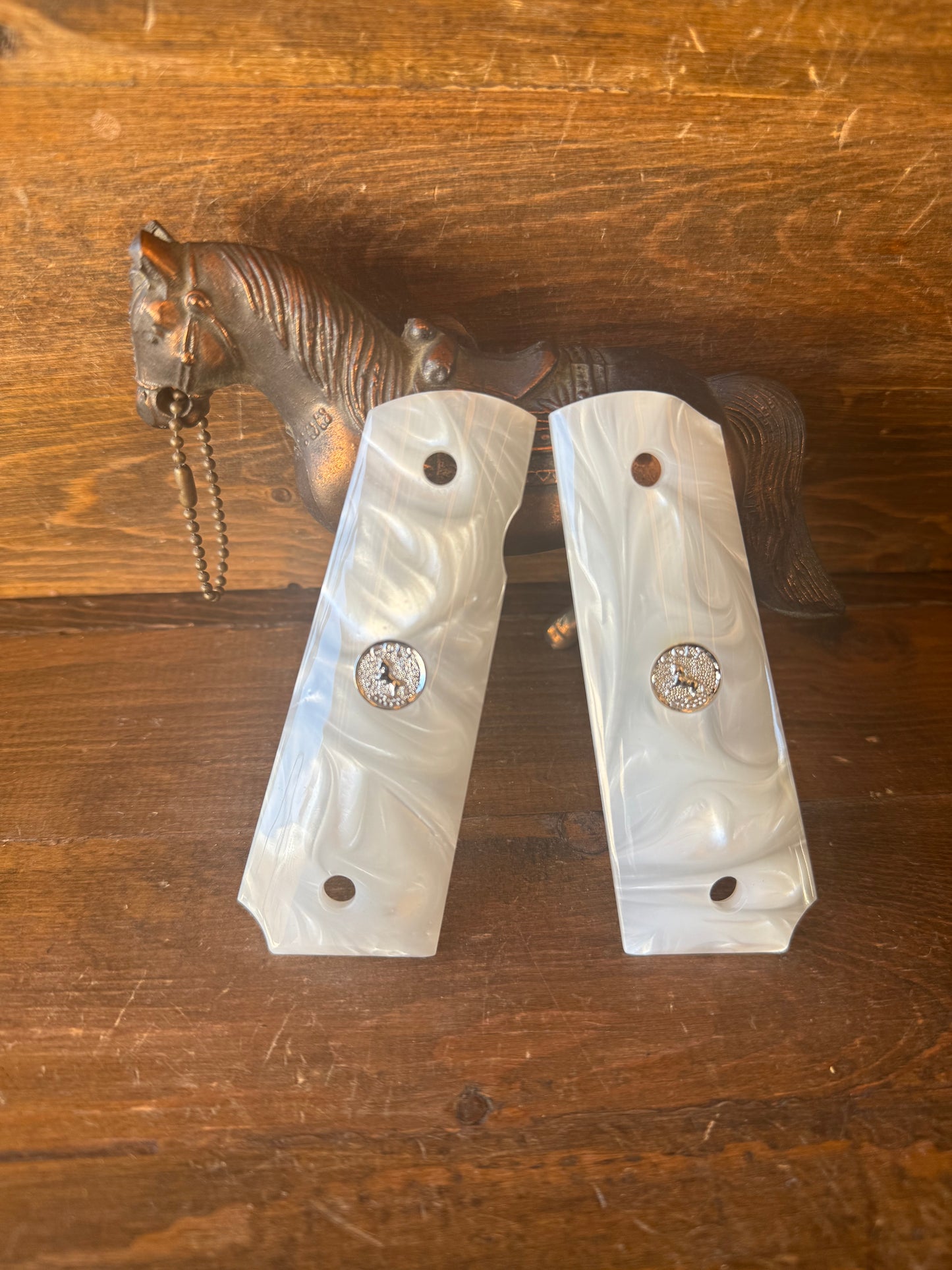 Pearl silver colt logo grips (1911)